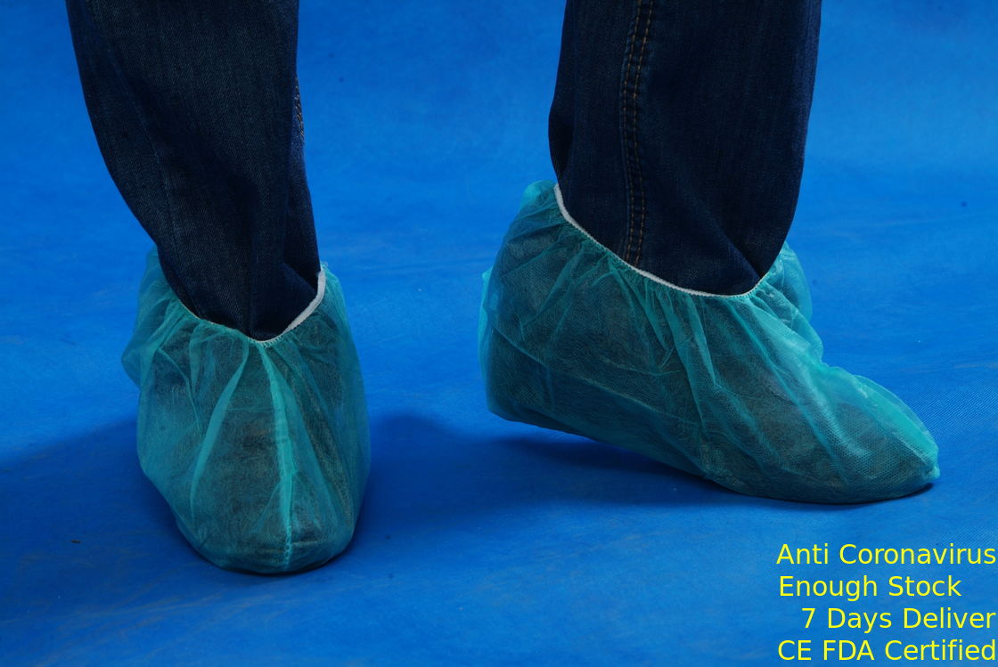 反スリップのプラスチック フィートの使い捨て可能な靴は淡いブルーの色30gsmの厚さをカバーします サプライヤー